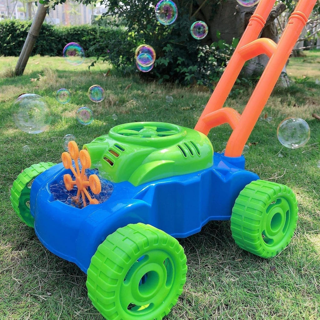 Close up on a colorful, plastic mower toy for kids, which creates hundreds of bubbles when the power button is turned on. 