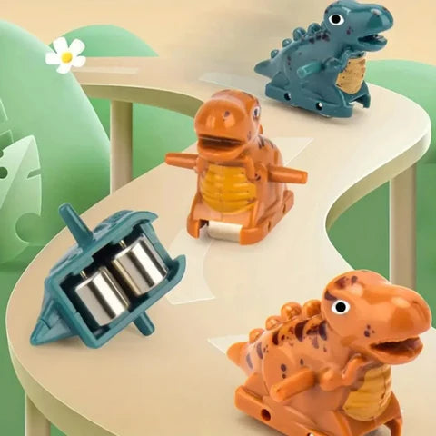 Close up on dinosaur figurines featured in the T-Rex Slide toy.