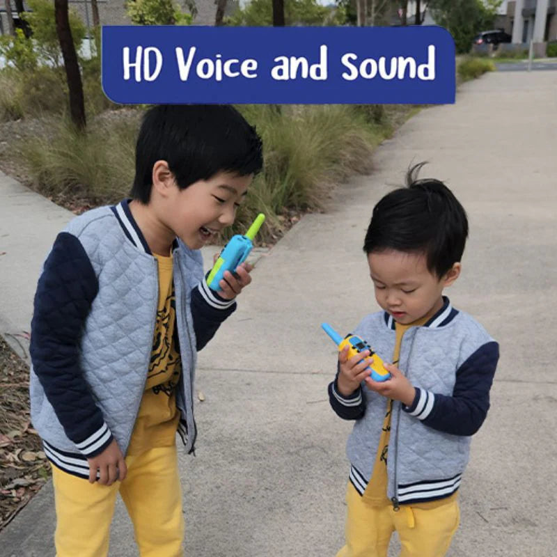 Brothers having fun playing with walkie talkies. 