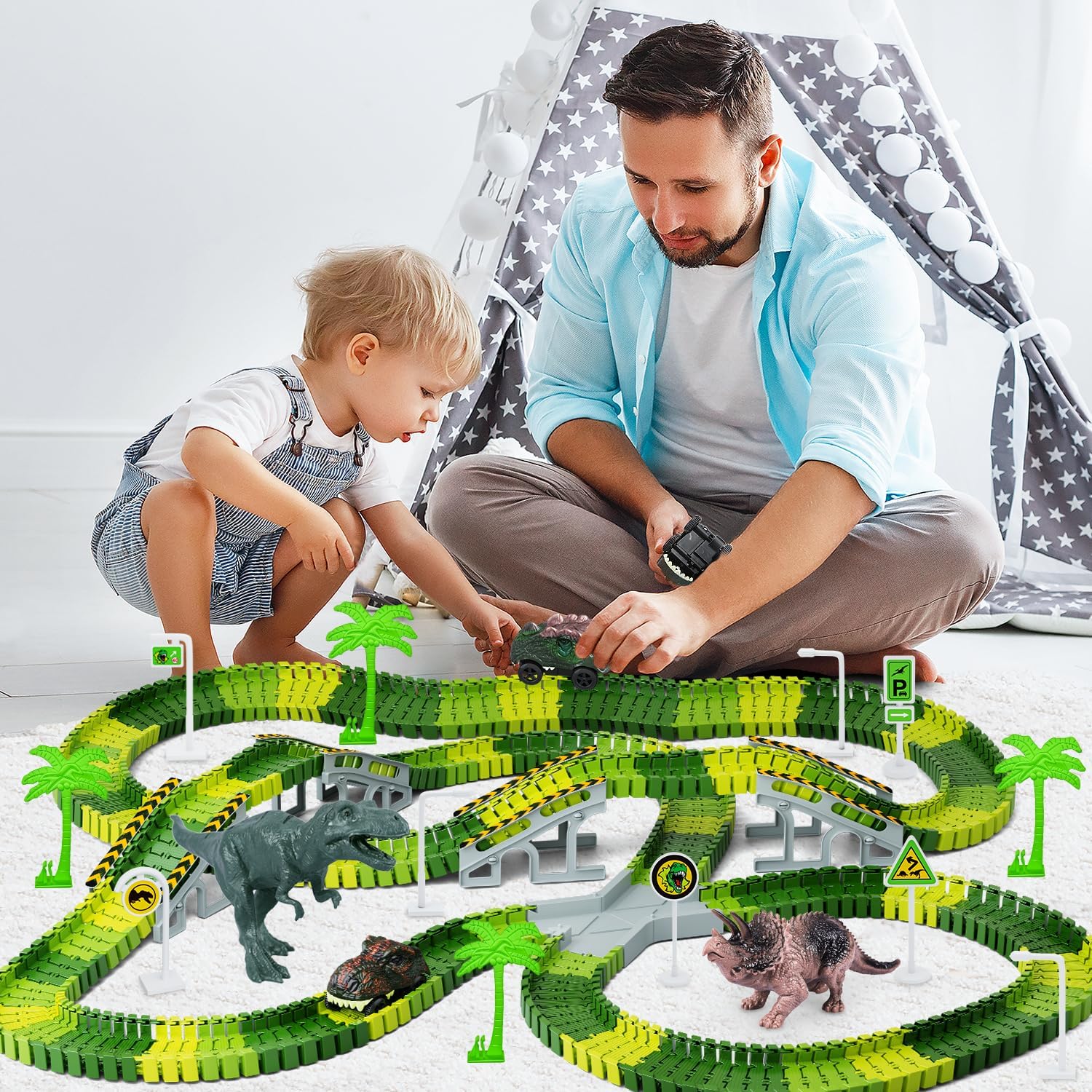 Father and son playing with the DIY Jurassic Race Track toy.